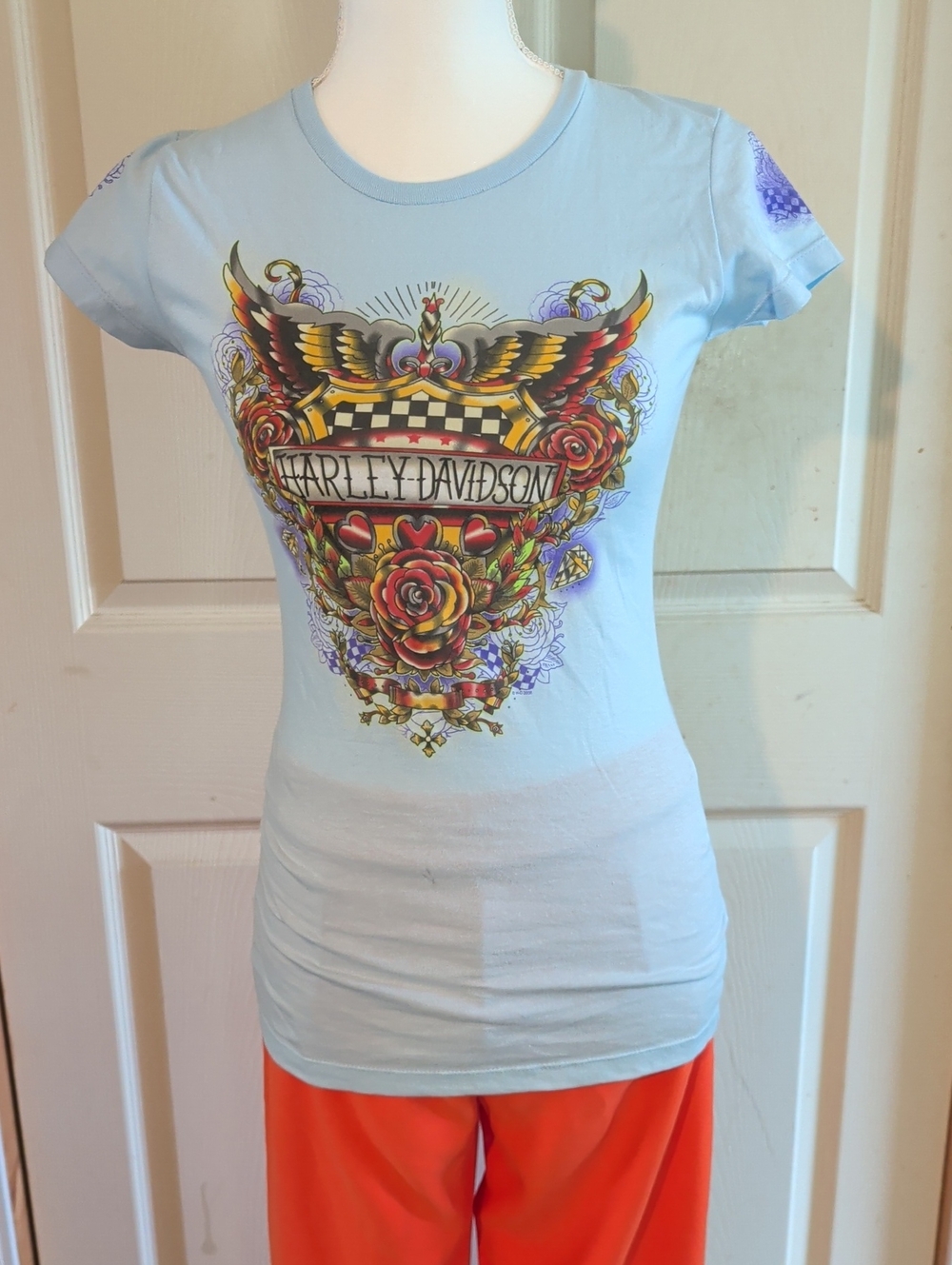 Harley-Davidson Light Blue Women's Tee with Multicolor Floral Wing Graphic